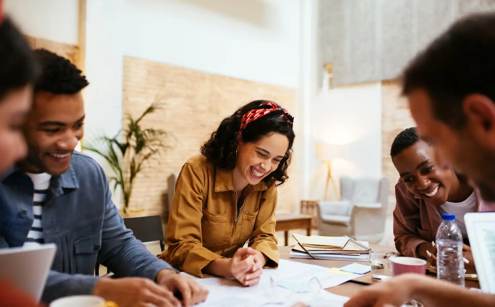 A group of diverse professionals collaborating around a table